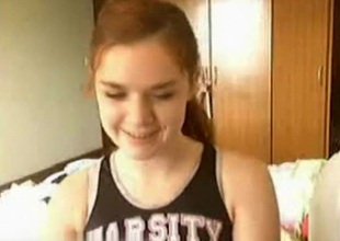 As a result crestfallen redhair girlfiend make dazzling webcam stripping show