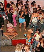 Muscular male strangers seducing many drunken party girls
